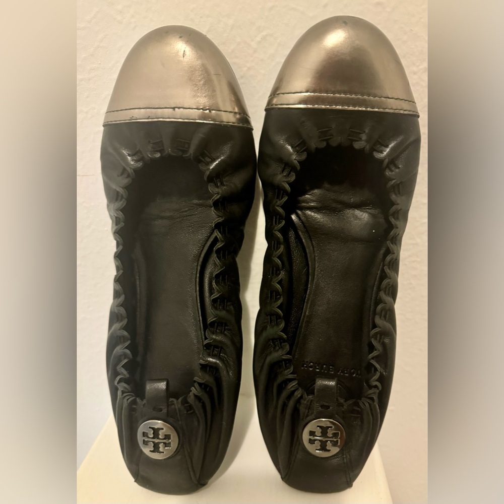 Tory Burch women's ballet flats, SZ- 6.5. black leather, with a gold toe.